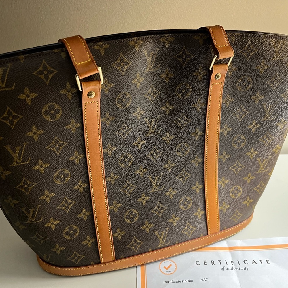 I am selling a Vintage Authentic Babylone Louis Vuitton tote.